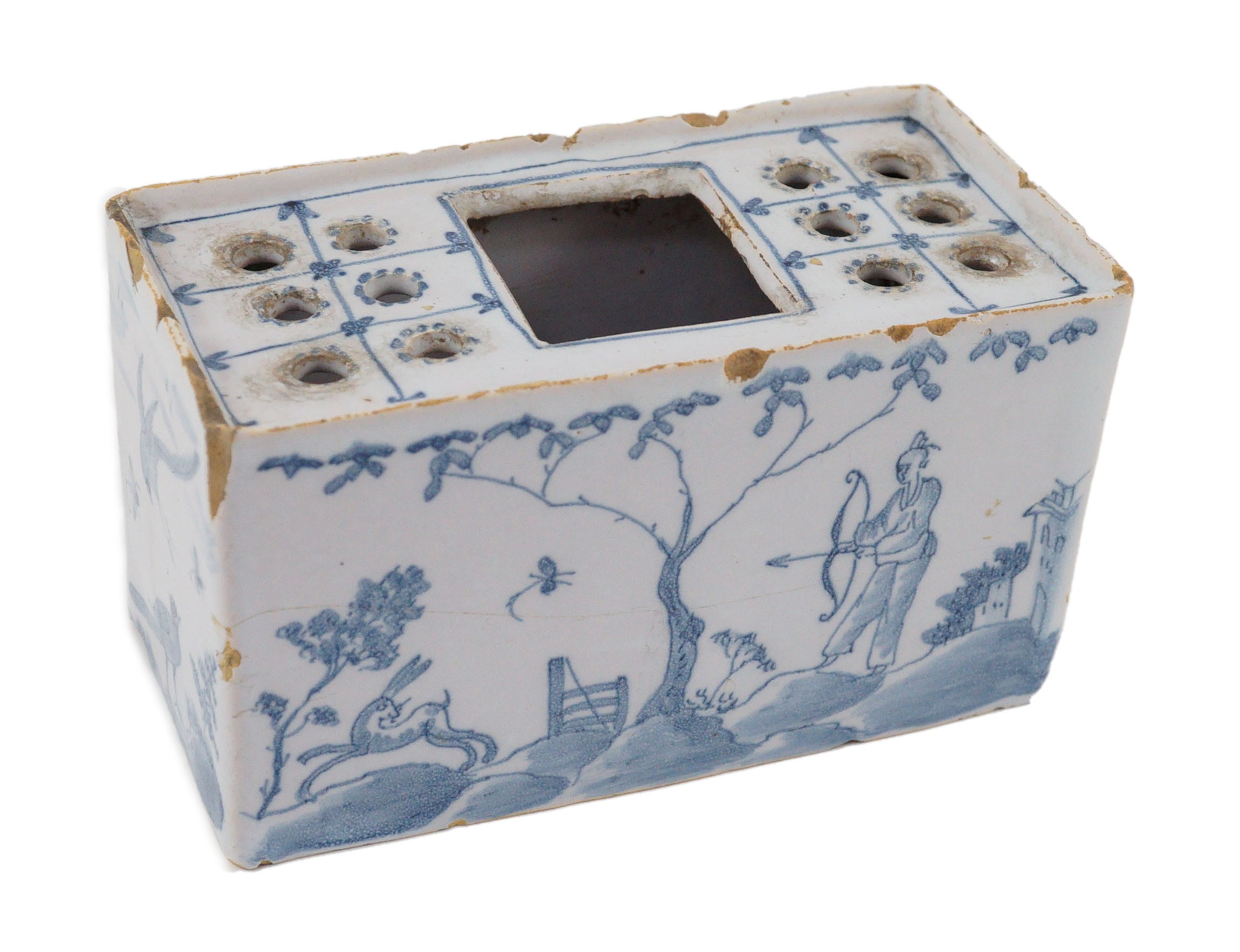 An English delftware flower brick, mid 18th century, 14.5cm wide, chips and crack